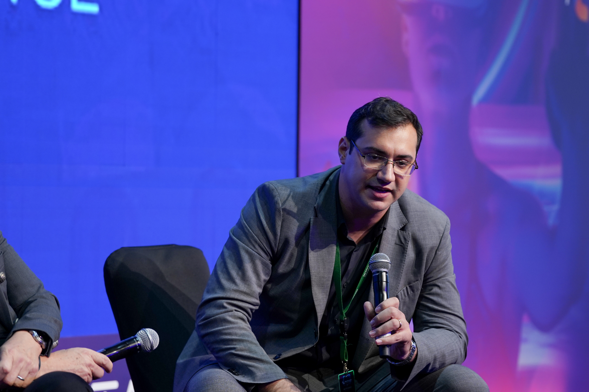 Blockchain Central representative speaking on stage